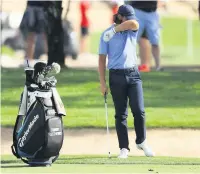  ?? Warren Little ?? ● Tommy Fleetwood reacts on the 11th hole on Day 4 of the Abu Dhabi Championsh­ip