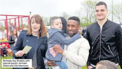  ??  ?? Birthday boy Bradley with special guests Jermain Defoe and Vito Mannone