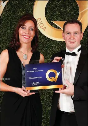  ??  ?? Bryan Lynch accepts his award at the National Q Mark Awards.