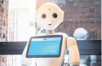  ?? 123RF ?? A Pepper robot assistant which uses Japanese humanoid technology.