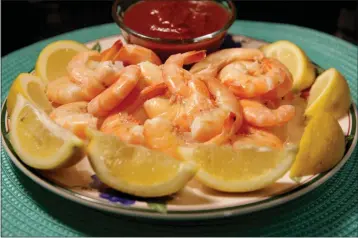  ?? HILLARY LEVIN — ST. LOUIS POST-DISPATCH — TNS ?? Lemon-boiled shrimp.