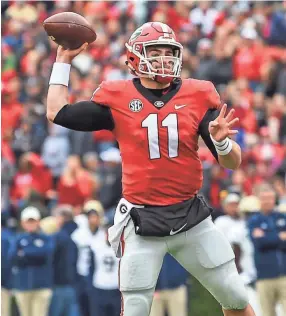  ??  ?? Georgia, led by QB Jake Fromm, will try to upset Alabama. DALE ZANINE/USA TODAY SPORTS