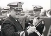  ?? BARTON SILVERMAN NYT FILE ?? Capt. Kenneth Force conducts the Merchant Marine Academy band in Uniondale, N.Y., on Oct. 18, 1989.