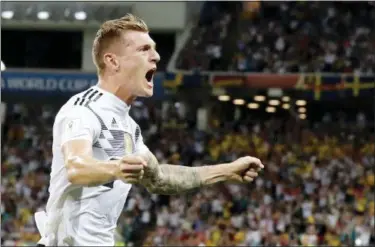  ?? FRANK AUGSTEIN — THE ASSOCIATED PRESS ?? Germany’s Toni Kroos celebrates after he scored his side’s second goal during the group F match between Germany and Sweden at the 2018 soccer World Cup in the Fisht Stadium in Sochi, Russia, Saturday.