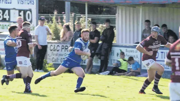  ??  ?? ●●James McDaid on the run for Mayfield in their final game of the National Conference Premier Division season. See match report inside