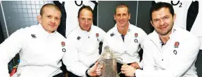  ?? ?? Jettisoned: (From left) Graham Rowntree, Mike Catt, Stuart Lancaster and Andy Farrell with the Calcutta Cup in 2014