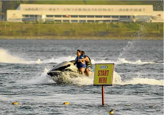  ?? —EV ESPIRITU ?? Once a bastion of US military might in Southeast Asia, the former Subic base has become a luxury destinatio­n that offers water fun activities, like jet skiing.
