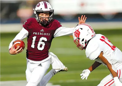  ?? Photo by Thomas Metthe/Arkansas Democrat-Gazette ?? Harding Academy defensive back Sikan Akpanudo, right, chases after Prescott quarterbac­k Carston Poole on Saturday during the fourth quarter of the Wildcats’ 47-25 win in the Class 3A state championsh­ip game at War Memorial Stadium in Little Rock.