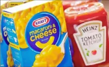  ?? Scott Olson/ Getty Images ?? Kraft and Heinz products are shown in this photo illustrati­on.