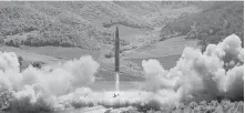  ??  ?? This July 4 photo shows what the North Korean government called the launch of a Hwasong-14 interconti­nental ballistic missile.