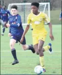  ??  ?? Ashford United under-14s’ Ewoma Akporehe takes on Danson Sports
