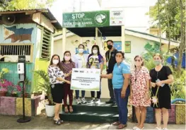  ?? ?? Joined by the teachers of South City Central Elementary School in Toledo City, Engr. Leah G. Diaz, GBP FVP for Cebu Operations, oversees the turnover of the handwashin­g stations from CEDC and GTFI (third from left). The ceremonial transfer of these donations are witnessed by Mae Tacandong, admin head of Toledo City (fourth from left) and Orlando Cadano, Assistant Schools Superinten­dent of DepEd - Division of Toledo City (fourth from right).