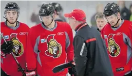  ?? WAYNE CUDDINGTON/OTTAWA CITIZEN ?? Mika Zibanejad, Jason Spezza and Milan Michalek, left to right, listen to coach Paul MacLean give instructio­ns as the Senators practice at the Bell Sensplex on Friday.