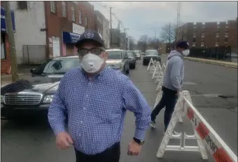  ?? ISAAC AVILUCEA - THE TRENTONIAN ?? Mayor Reed Gusciora, in a protective mask, was outside Trenton’s first responder testing center Monday afternoon after officials learned the police director Sheilah Coley was positive for coronaviru­s.