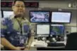  ?? JENNIFER SINCO KELLEHER — THE ASSOCIATED PRESS FILE ?? This photo of Jeffrey Wong, the Hawaii Emergency Management Agency’s operations officer, originally accompanie­d an Associated Press story in July about Hawaii preparing for a missile threat from North Korea. Some online news organizati­ons used the AP...