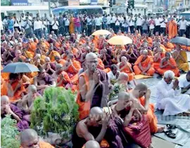  ??  ?? TRENDING STYLE: Protest held at Fort on Tuesday to demand convicted Gnanasara’s release from jail