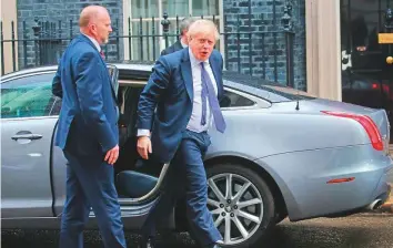  ?? AFP ?? Boris Johnson arrives at 10 Downing Street in London yesterday. The British PM revamped his top team yesterday in his first cabinet reshuffle since taking Britain out of the European Union.