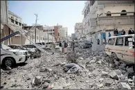  ?? AP/HANI MOHAMMED ?? A lamppost lies amid the rubble after deadly airstrikes in and near the presidenti­al compound Monday in Sanaa, Yemen.