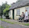  ??  ?? Archie and Ivy Peppard had to put up with hikers traipsing past their front door