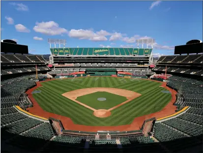  ?? RAY CHAVEZ — BAY AREA NEWS GROUP FILE ?? The Coliseum in Oakland sits empty on March 31as the Major League Baseball season was postponed due to the coronaviru­s outbreak.