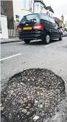  ??  ?? ROAD HUMP Pesky pothole