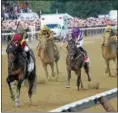  ?? PHOTO SPENCER TULIS/SPECIAL TO DIGITAL FIRST MEDIA ?? Javier Castellano guided Catholic Boy to a victory in the 149th Running of The Runhappy Travers a Grade I race worth $1, 250,000.