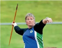  ?? PHOTO: WARWICK SMITH/FAIRFAX NZ ?? Manawatu-wanganui W50 competitor Jenny Fee about to send the javelin sailing during the North Island masters athletics championsh­ips at Massey University at the weekend.