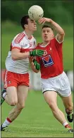  ??  ?? A STEP AHEAD: Derry’s Niall Loughlin (left) and Adrian Reid