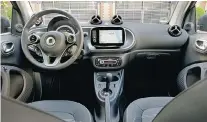  ??  ?? The 2016 Smart fortwo interior is no longer claustroph­obic.