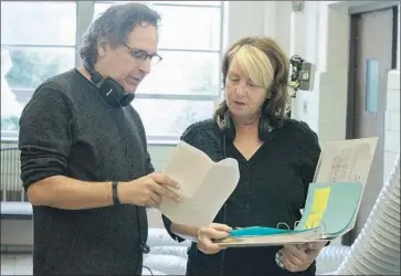  ?? Virginia Sherwood NBC ?? CREATOR Jason Katims consults with director-producer Rosemary Rodriguez about high-school-set “Rise.”