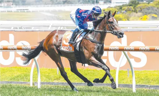  ??  ?? Ayrton, ridden by Jamie Kah, wins the Ken Sturt Handicap at Caulfield yesterday. Picture: Getty Images