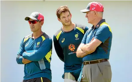  ?? GETTY IMAGES ?? Australian captain Tim Paine, centre, with coach Justin Langer, left, and selector Greg Chappell.