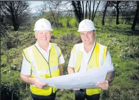 ??  ?? Gary Harker and Adrian Burr from Springbour­ne Homes at the site of the proposed developmen­t in Wellsborou­gh, near Market Bosworth.