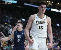  ?? ASSOCIATED PRESS FILE PHOTO ?? Purdue center Zach Edey (15) reacts after being fouled by Fairleigh Dickinson in the second half of a first-round game in the men’s NCAA Tournament in Columbus, Ohio.