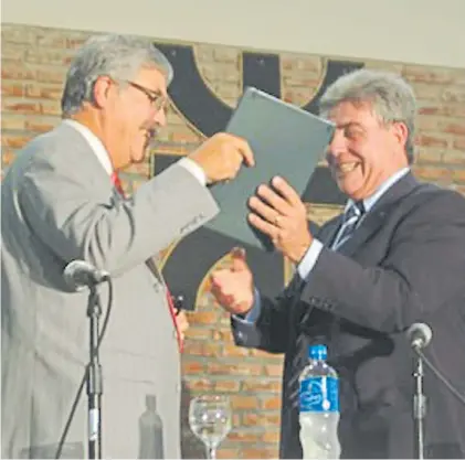  ??  ?? Con Julio De Vido. Fantini es decano de la Regional La Plata de la Universida­d Tecnológic­a Nacional.