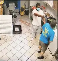  ?? More Than Pizza security video image ?? Video footage inside More Than Pizza in New Haven captured an armed robbery at the Blake Street restaurant on Saturday.