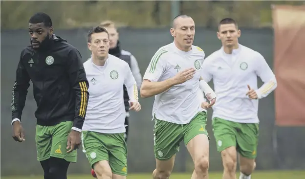  ??  ?? 0 The Celtic squad, still reeling from Saturday’s Old Firm defeat, are put through their paces ahead of tonight’s Europa League match against AC Milan