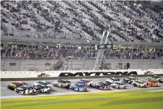  ?? AP Photo/John Raoux, File ?? ■ Drivers restart after a weather delay during the NASCAR Daytona 500 auto race at Daytona Internatio­nal Speedway on Sunday in Daytona Beach, Fla. It’s another season of change for NASCAR as it prepares for Sunday’s opening Daytona 500.