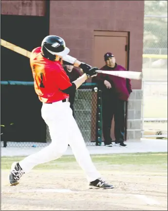  ??  ?? Blackhawk Westin Church hits the ball in the game against Gentry.