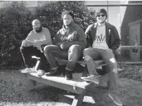  ?? KAITLIN MCKEOWN/STAFF ?? Former New Kent football player Juan Mikel-Jones, center, with his father, Woodrow Jones, left, and filmmaker Liam Thurkettle outside of Sentara Regional Medical Center in Williamsbu­rg.