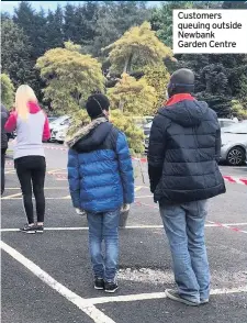  ??  ?? Customers queuing outside Newbank Garden Centre