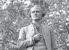  ?? FRANK FRANKLIN II/AP ?? Alexander Hamilton is almost universall­y depicted as an abolitioni­st in popular modern works, but a new research paper cites evidence that he was a slave trader and owner himself.