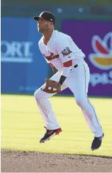  ?? PHOTOS COURTESY OF PAWTUCKET RED SOX ?? IN THE SWING OF THINGS: Dustin Pedroia got some work in for Pawtucket last night, going 1-for-3 at the plate while also playing five innings at second base.