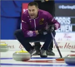  ?? CANADIAN PRESS FILE PHOTO ?? Kaitlyn Lawes, not pictured, along with John Morris, above, will represent Canada when mixed doubles curling makes its Olympic debut in Pyeongchan­g this February.