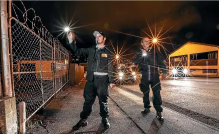  ?? CHRIS SKELTON/STUFF ?? Shannon Mudge, left, and Shane Fuller, from Private security firm Tactical Response Team, which has started night patrols in Lyttelton.