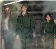  ?? ?? Trapper (Dan Stevens, from left), Dr. Ilene Andrews (Rebecca Hall) and Jia (Kaylee Hottle) confront a host of perils in Godzilla x Kong: The New Empire.”