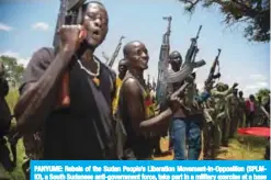  ??  ?? PANYUME: Rebels of the Sudan People’s Liberation Movement-in-Opposition (SPLMIO), a South Sudanese anti-government force, take part in a military exercise at a base in Panyume. — AFP