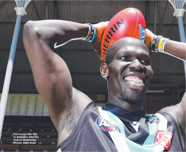  ??  ?? Port recruit Aliir Aliir at Adelaide’s Alberton Oval on Wednesday. Picture: Mark Brake