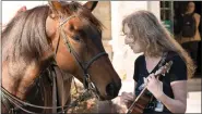  ?? PHOTO COURTESY OF AMY M. SCHWAB PHOTOGRAPH­Y ?? Singer-songwriter Lisa Lerman performed during the event.