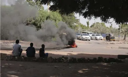  ?? ?? People burn tires in Khartoum on Sunday. Activists have announced a schedule of protests leading up to mass rallies on 13 November. Photograph: Marwan Ali/AP